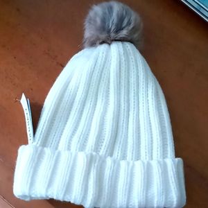 Winter pom pom hat